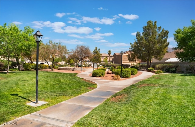 9025 Loggers Mill Ave, Las Vegas, NV 89143 - surrounding community featuring a lawn