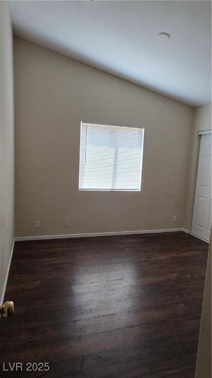 6113 Desert Haven Rd, Las Vegas, NV 89130 - spare room with baseboards and dark wood-type flooring