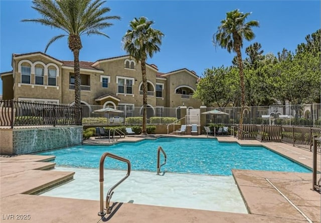 9975 Peace Way Unit 1069, Las Vegas, NV 89147 - community pool with a patio