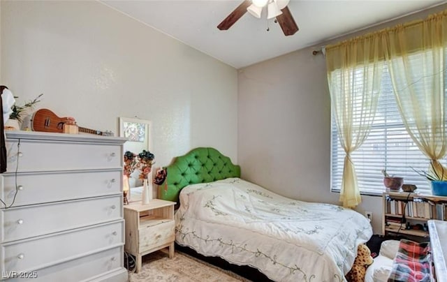 9975 Peace Way Unit 1069, Las Vegas, NV 89147 - bedroom featuring multiple windows and a ceiling fan
