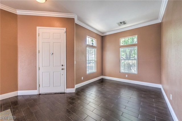 5528 Stone Lagoon St, North Las Vegas, NV 89031 - empty room featuring crown molding and dark wood finished floors