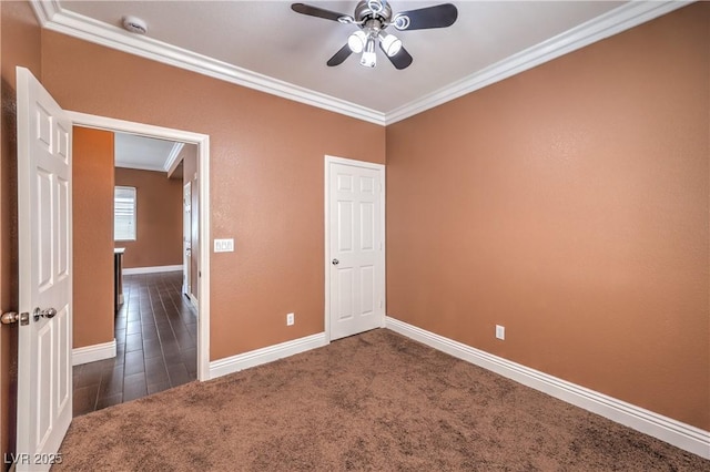 5528 Stone Lagoon St, North Las Vegas, NV 89031 - carpeted empty room featuring crown molding, a ceiling fan, and a smoke detector