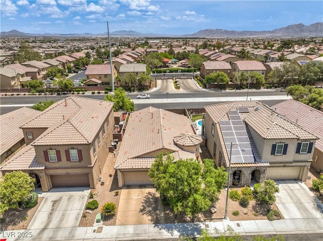 5528 Stone Lagoon St, North Las Vegas, NV 89031 - aerial perspective of suburban area with mountains