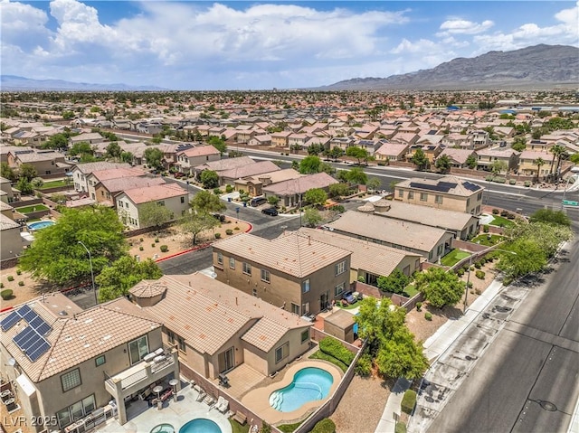 5528 Stone Lagoon St, North Las Vegas, NV 89031 - aerial view of residential area featuring a mountainous background