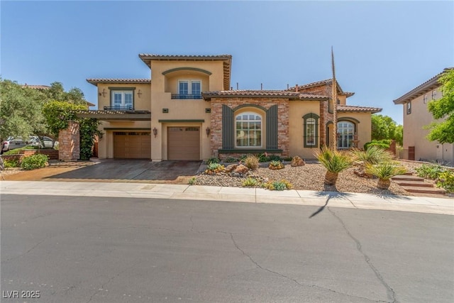 9992 Peak Lookout St, Las Vegas, NV 89178 - mediterranean / spanish home with an attached garage, a tile roof, driveway, and stucco siding