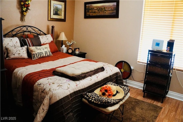 9355 W Viking Rd, Las Vegas, NV 89147 - bedroom featuring wood finished floors and baseboards