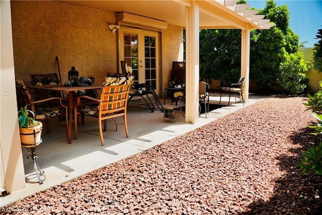 9355 W Viking Rd, Las Vegas, NV 89147 - view of patio with french doors and outdoor dining area