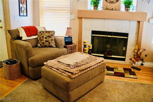 9355 W Viking Rd, Las Vegas, NV 89147 - living area with wood finished floors and a tile fireplace