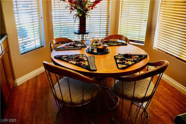 9355 W Viking Rd, Las Vegas, NV 89147 - dining area featuring baseboards and wood finished floors