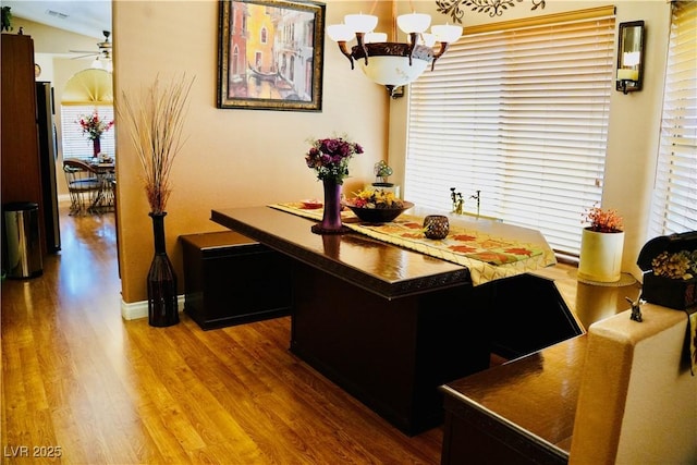 9355 W Viking Rd, Las Vegas, NV 89147 - office area featuring a chandelier, wood finished floors, ceiling fan, and baseboards