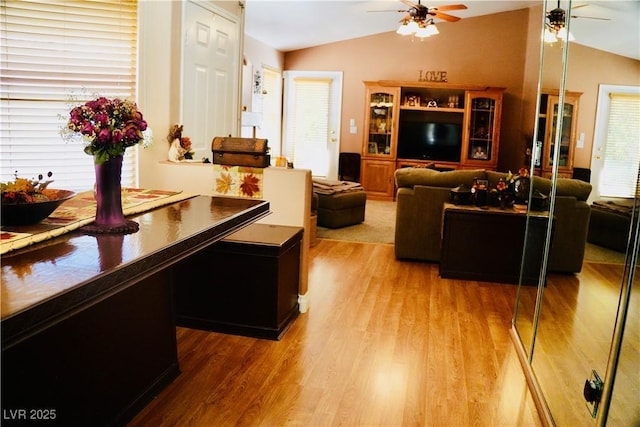 9355 W Viking Rd, Las Vegas, NV 89147 - living room with ceiling fan, lofted ceiling, healthy amount of natural light, and wood finished floors