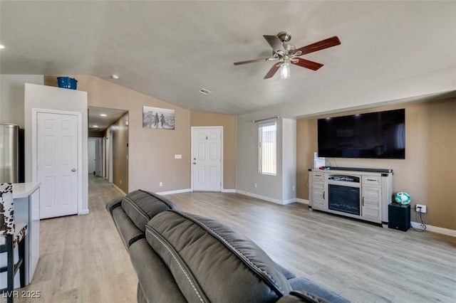 1905 Eskam St, Las Vegas, NV 89156 - living area featuring vaulted ceiling, ceiling fan, light wood-style flooring, baseboards, and recessed lighting