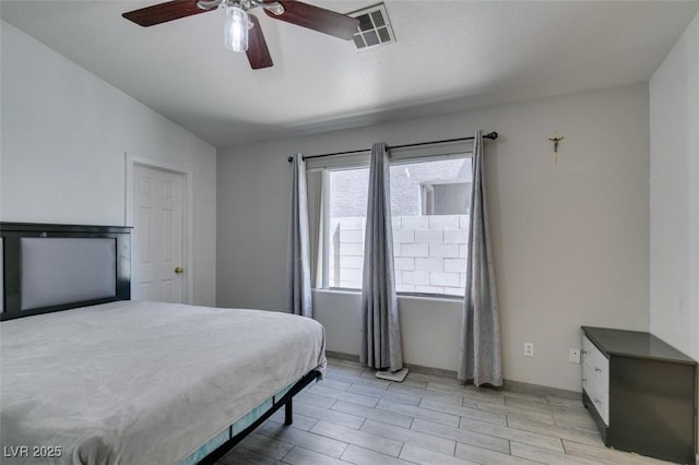 1905 Eskam St, Las Vegas, NV 89156 - bedroom featuring lofted ceiling, wood finish floors, and a ceiling fan