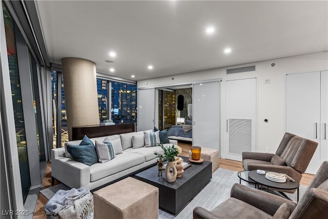 3726 Las Vegas Blvd Unit 606, Las Vegas, NV 89158 - living area featuring wood finished floors and recessed lighting