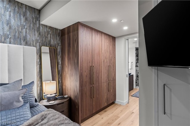 3726 Las Vegas Blvd Unit 606, Las Vegas, NV 89158 - bedroom with light wood finished floors, recessed lighting, and baseboards
