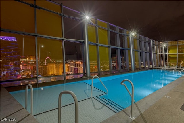 3726 Las Vegas Blvd Unit 606, Las Vegas, NV 89158 - pool at night featuring a community pool