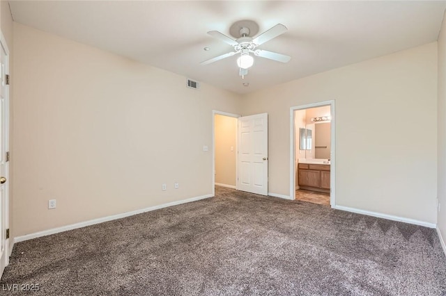 830 Carnegie St Unit 824, Henderson, NV 89052 - unfurnished bedroom with carpet, baseboards, a ceiling fan, and connected bathroom