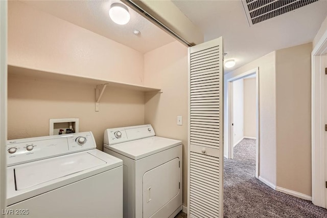 830 Carnegie St Unit 824, Henderson, NV 89052 - laundry area featuring separate washer and dryer, dark colored carpet, and baseboards