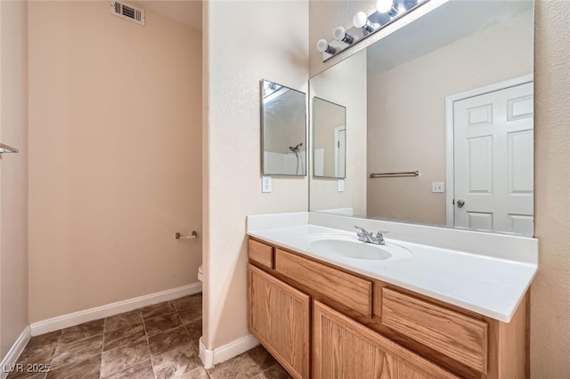 830 Carnegie St Unit 824, Henderson, NV 89052 - bathroom featuring toilet, vanity, and baseboards