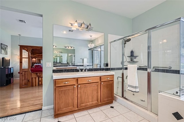 313 Glenridding St, Las Vegas, NV 89183 - full bath with tile patterned flooring, vanity, and a stall shower