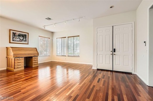313 Glenridding St, Las Vegas, NV 89183 - foyer entrance featuring track lighting and wood-type flooring