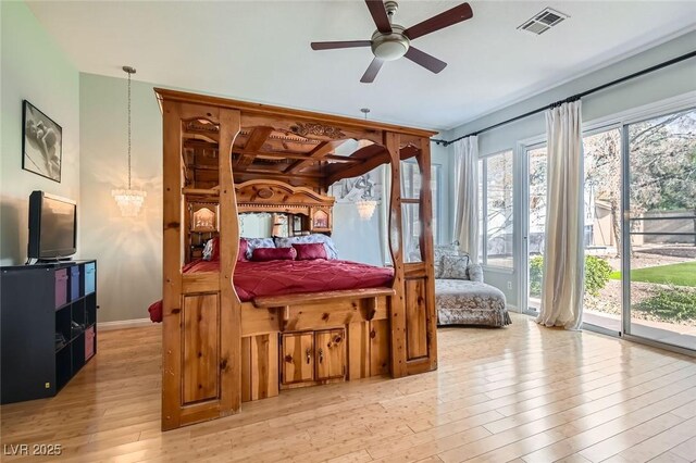 313 Glenridding St, Las Vegas, NV 89183 - bedroom with access to exterior, wood-type flooring, and ceiling fan