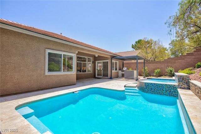 81 Alerion St, Las Vegas, NV 89138 - view of swimming pool featuring a patio and a pool with connected hot tub