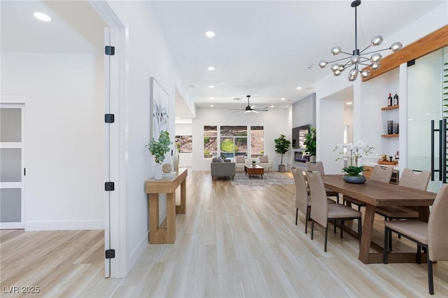 81 Alerion St, Las Vegas, NV 89138 - dining space with a ceiling fan, recessed lighting, a chandelier, and light wood-style flooring