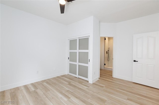 81 Alerion St, Las Vegas, NV 89138 - unfurnished bedroom with light wood-type flooring, a ceiling fan, and baseboards