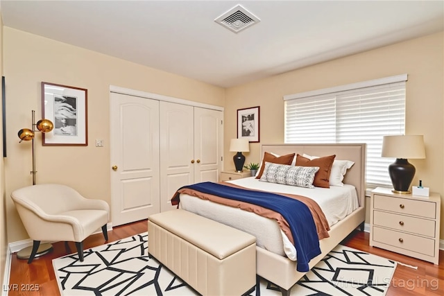 9413 Cedar Heights Ave, Las Vegas, NV 89134 - bedroom with a closet and wood finished floors