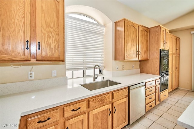 9413 Cedar Heights Ave, Las Vegas, NV 89134 - kitchen featuring dishwasher, a sink, light countertops, and light tile patterned floors