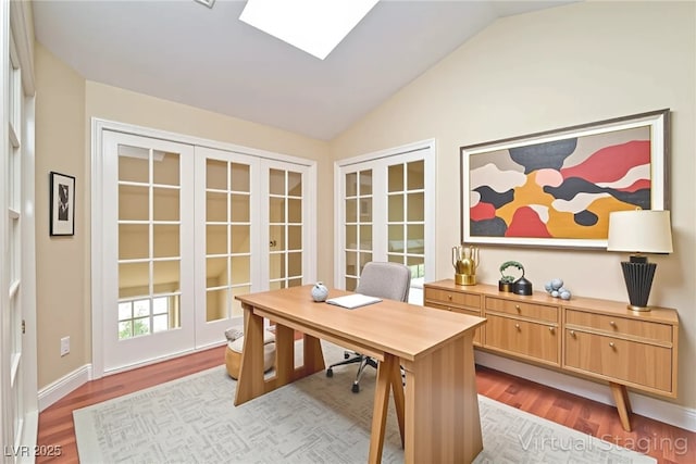9413 Cedar Heights Ave, Las Vegas, NV 89134 - office space with french doors, vaulted ceiling, wood finished floors, a skylight, and baseboards