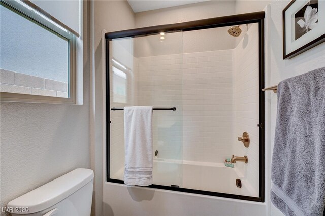 2651 Deep Canyon St, Henderson, NV 89044 - bathroom featuring toilet and enclosed tub / shower combo