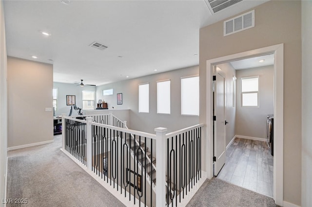 2651 Deep Canyon St, Henderson, NV 89044 - hallway featuring healthy amount of natural light, recessed lighting, an upstairs landing, and carpet floors