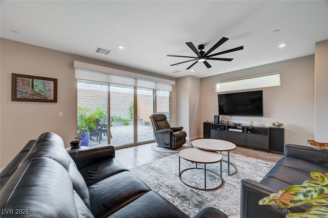 2651 Deep Canyon St, Henderson, NV 89044 - living area with light wood-style floors, a ceiling fan, and recessed lighting