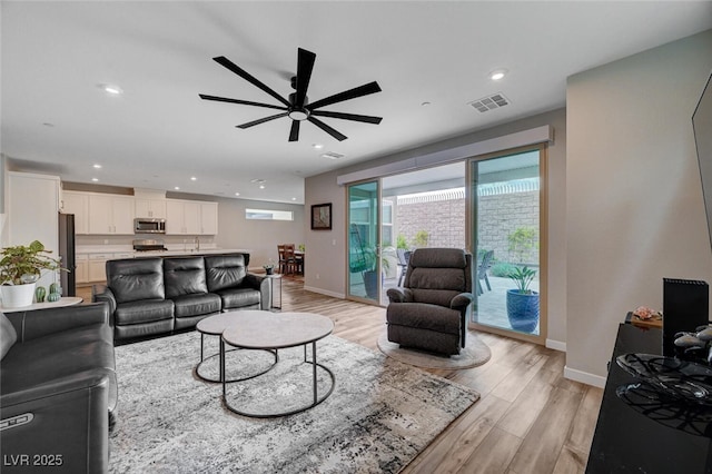 2651 Deep Canyon St, Henderson, NV 89044 - living room with ceiling fan, light wood finished floors, and recessed lighting