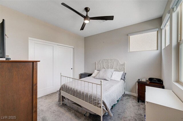 2651 Deep Canyon St, Henderson, NV 89044 - carpeted bedroom with multiple windows, ceiling fan, and a closet
