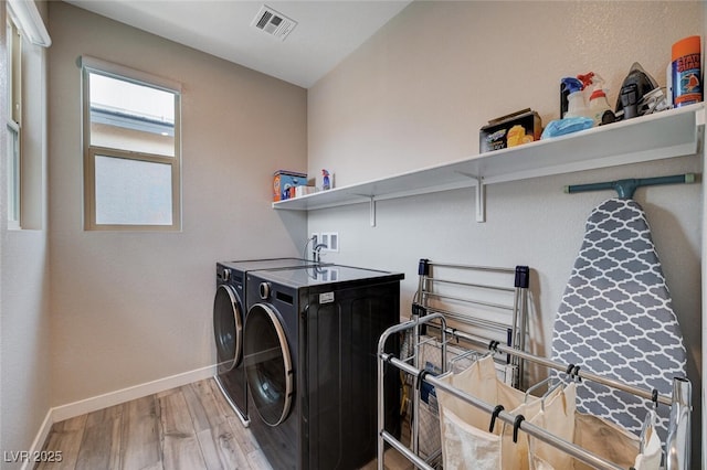 2651 Deep Canyon St, Henderson, NV 89044 - laundry area featuring washer and clothes dryer and light wood-type flooring
