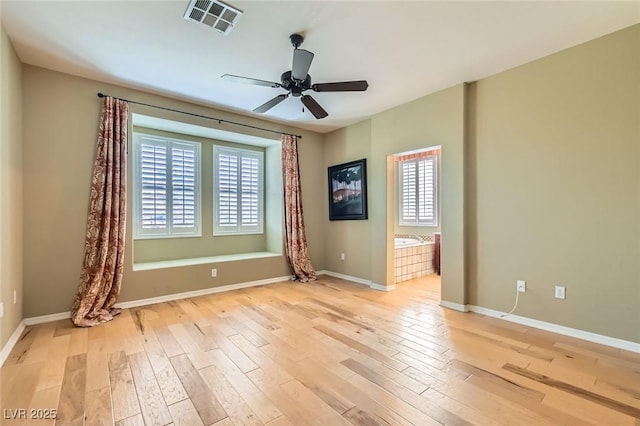 62 Myrtle Springs Ct, Las Vegas, NV 89148 - spare room featuring healthy amount of natural light, light wood-style floors, a ceiling fan, and baseboards