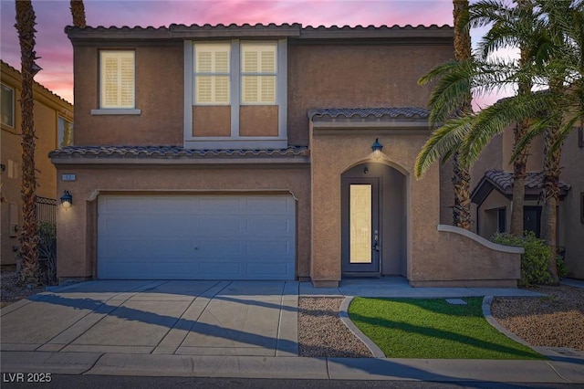 62 Myrtle Springs Ct, Las Vegas, NV 89148 - view of front of property with a garage, stucco siding, and driveway