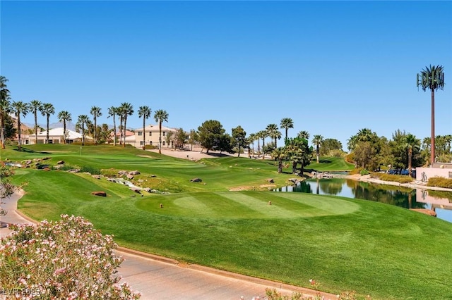62 Myrtle Springs Ct, Las Vegas, NV 89148 - surrounding community with a water view, golf course view, and a lawn