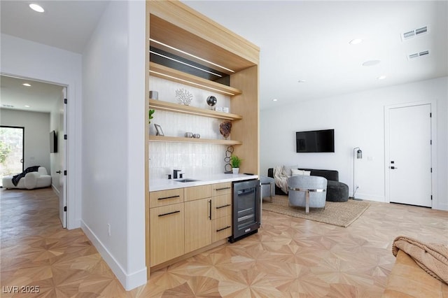 11926 Port Labelle Dr, Las Vegas, NV 89141 - bar featuring wine cooler, backsplash, and recessed lighting