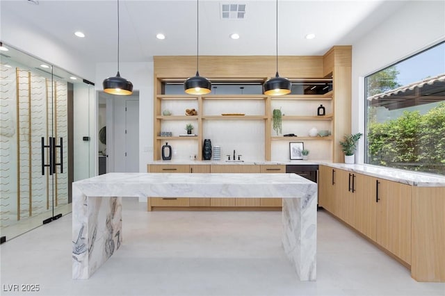 11926 Port Labelle Dr, Las Vegas, NV 89141 - kitchen featuring light brown cabinets, open shelves, modern cabinets, pendant lighting, and recessed lighting