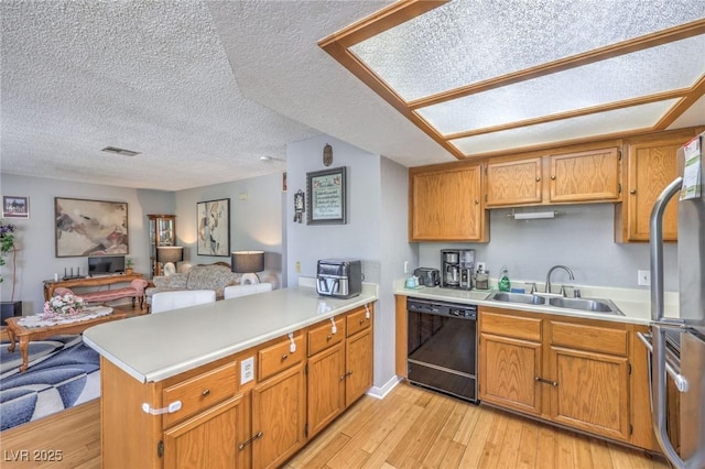 7961 Lions Rock Way Unit 202, Las Vegas, NV 89128 - kitchen with dishwasher, a peninsula, a sink, open floor plan, and light countertops