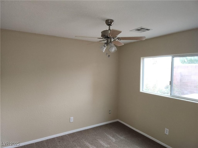 5052 Whistling Acres Ave, Las Vegas, NV 89131 - carpeted spare room featuring a ceiling fan and baseboards