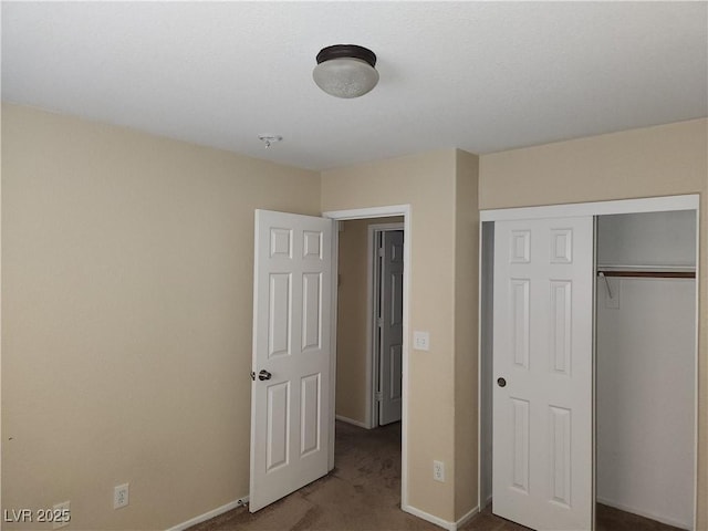 5052 Whistling Acres Ave, Las Vegas, NV 89131 - unfurnished bedroom with carpet, baseboards, and a closet