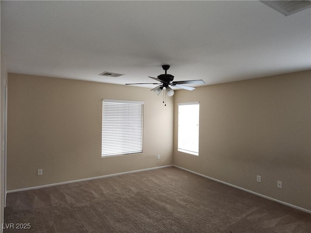 5052 Whistling Acres Ave, Las Vegas, NV 89131 - carpeted spare room with baseboards and a ceiling fan