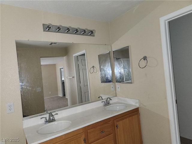 5052 Whistling Acres Ave, Las Vegas, NV 89131 - bathroom featuring double vanity