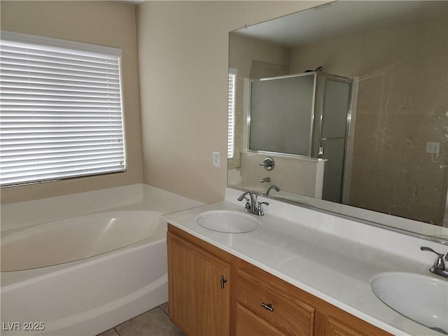5052 Whistling Acres Ave, Las Vegas, NV 89131 - full bath with a bath, double vanity, a stall shower, and tile patterned flooring