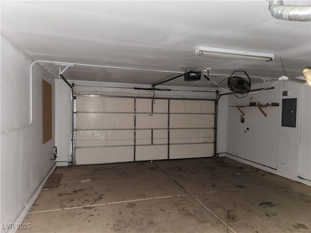 5052 Whistling Acres Ave, Las Vegas, NV 89131 - garage featuring electric panel and a garage door opener
